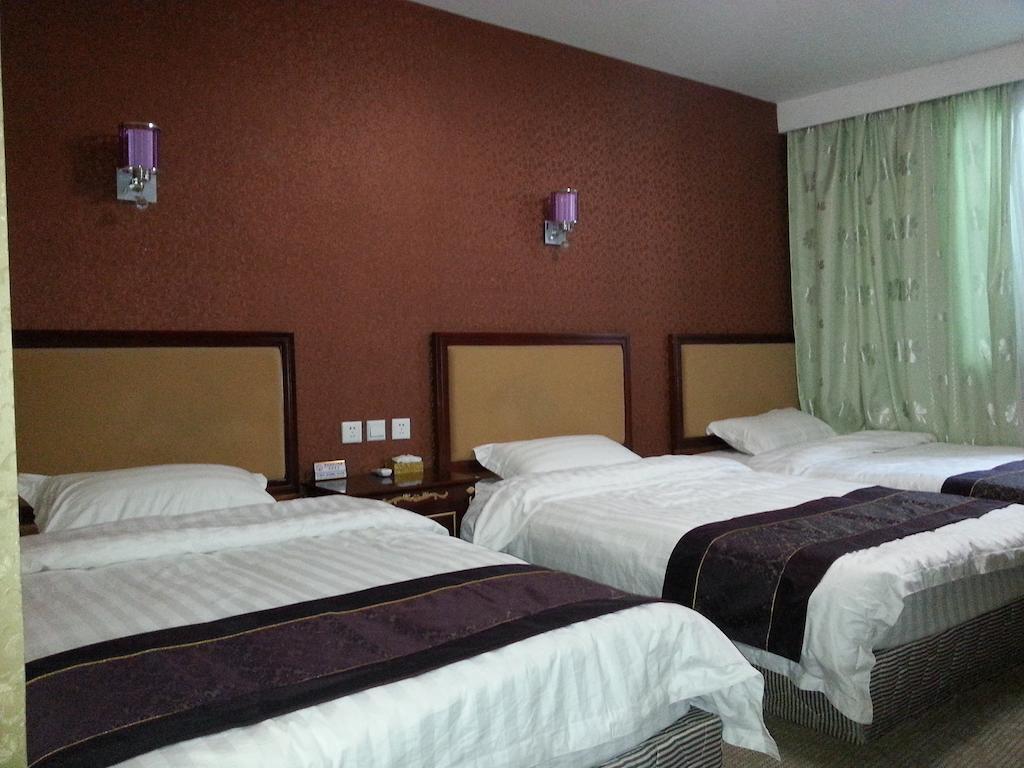Jiuxiang Hotel จิ่วไจ้โกว ห้อง รูปภาพ