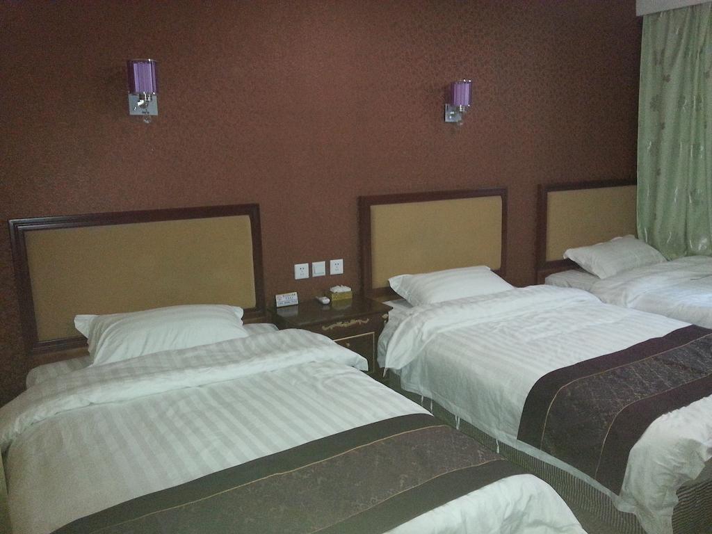 Jiuxiang Hotel จิ่วไจ้โกว ห้อง รูปภาพ