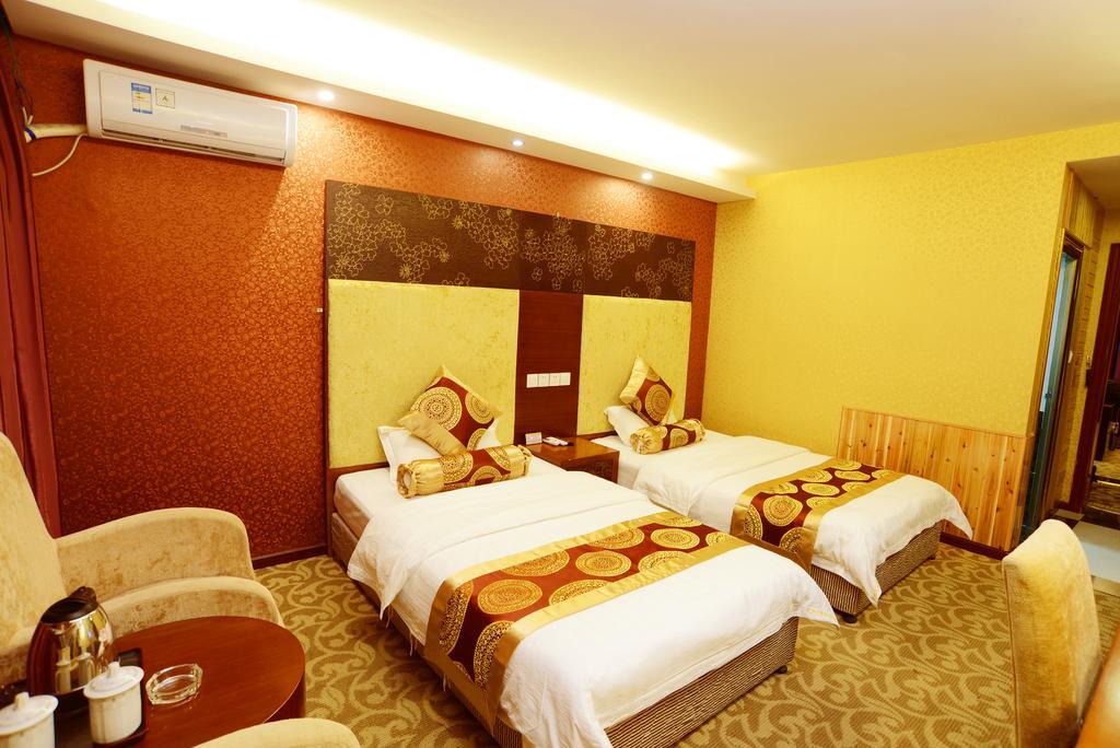 Jiuxiang Hotel จิ่วไจ้โกว ห้อง รูปภาพ